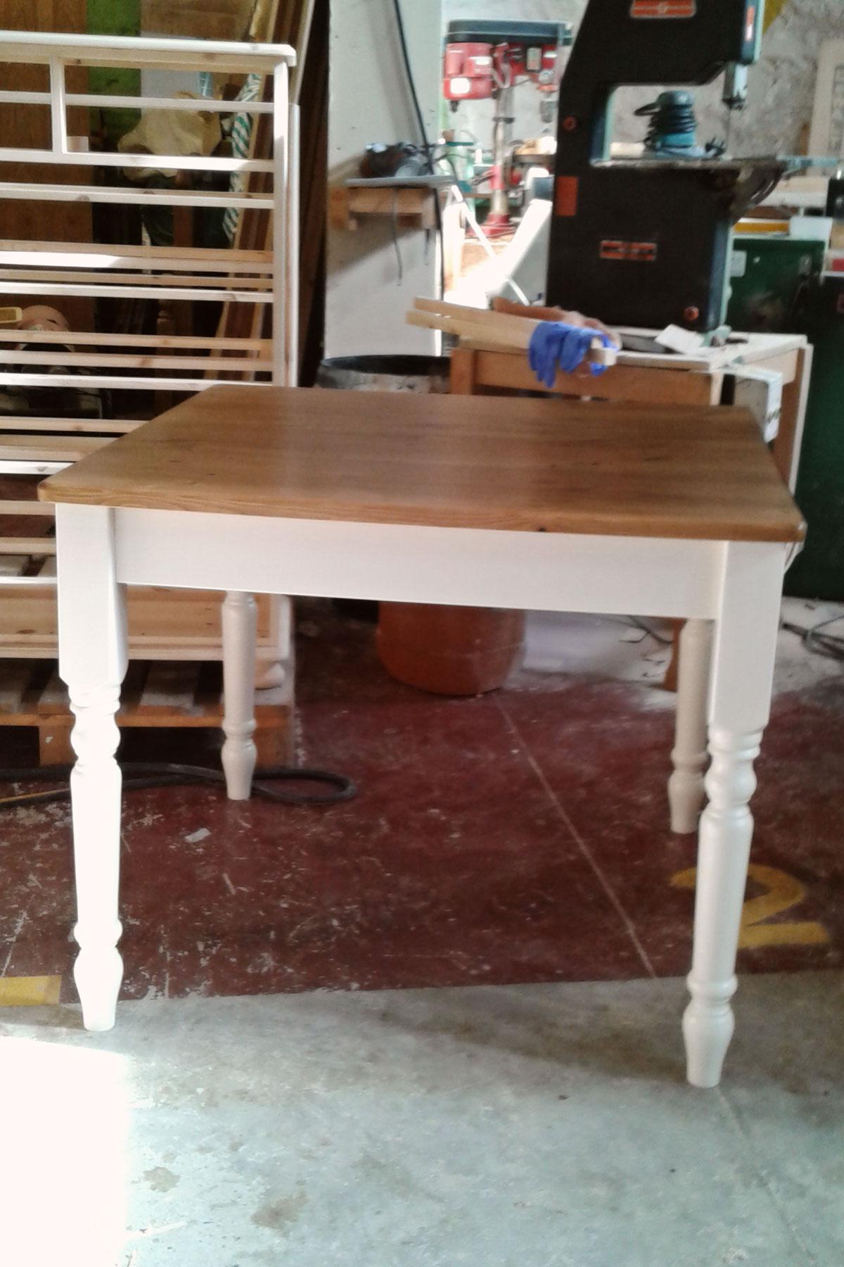 Custom made pine table with painted legs.