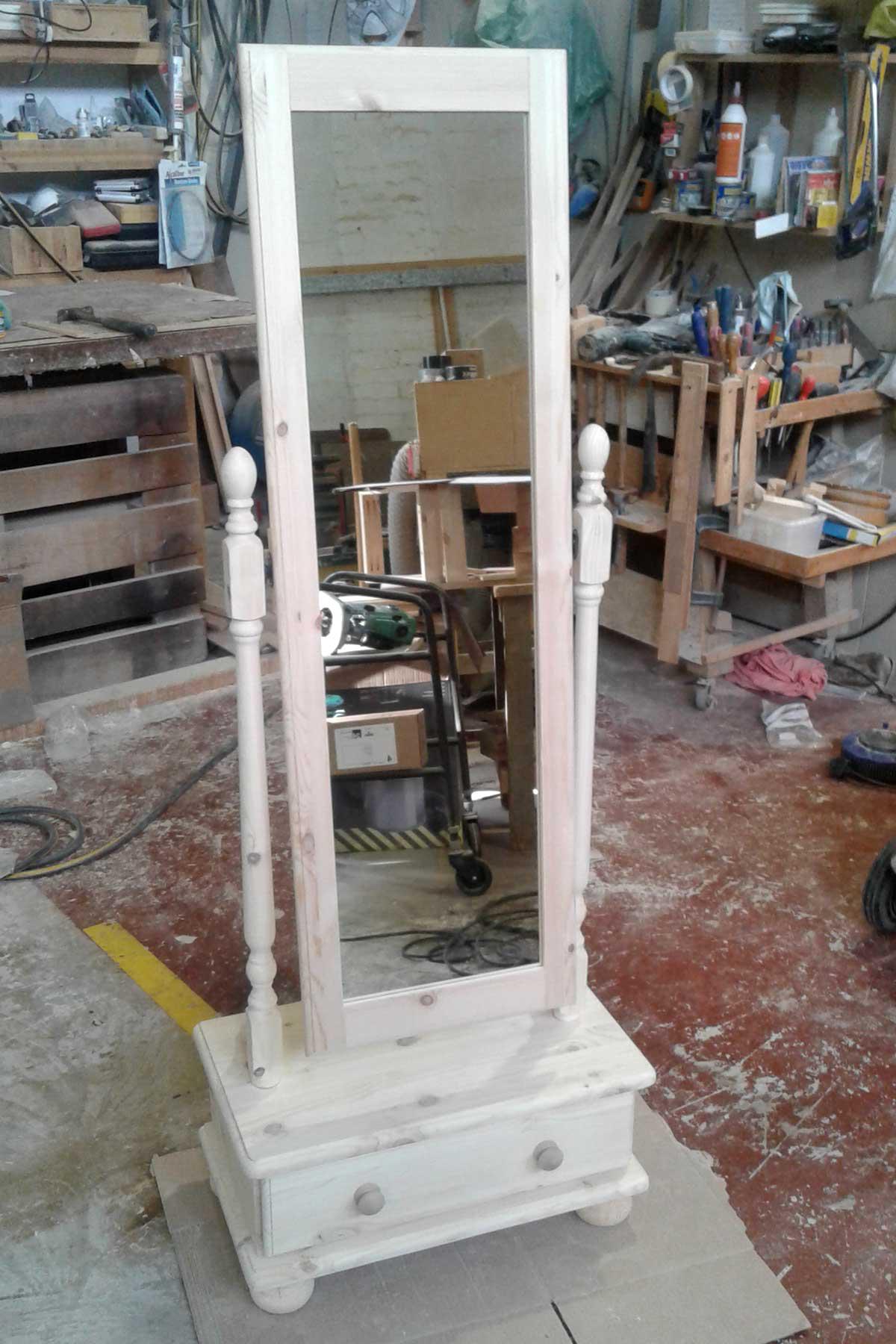 Free-standing full length pine mirror with drawer.